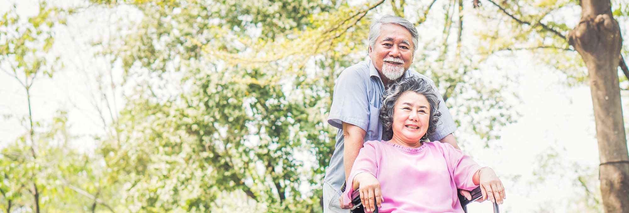 elderly couple smiling